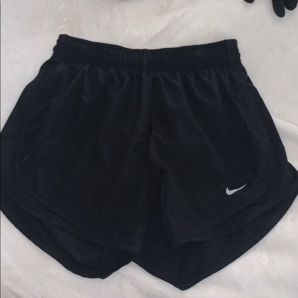 Black Nike running shorts